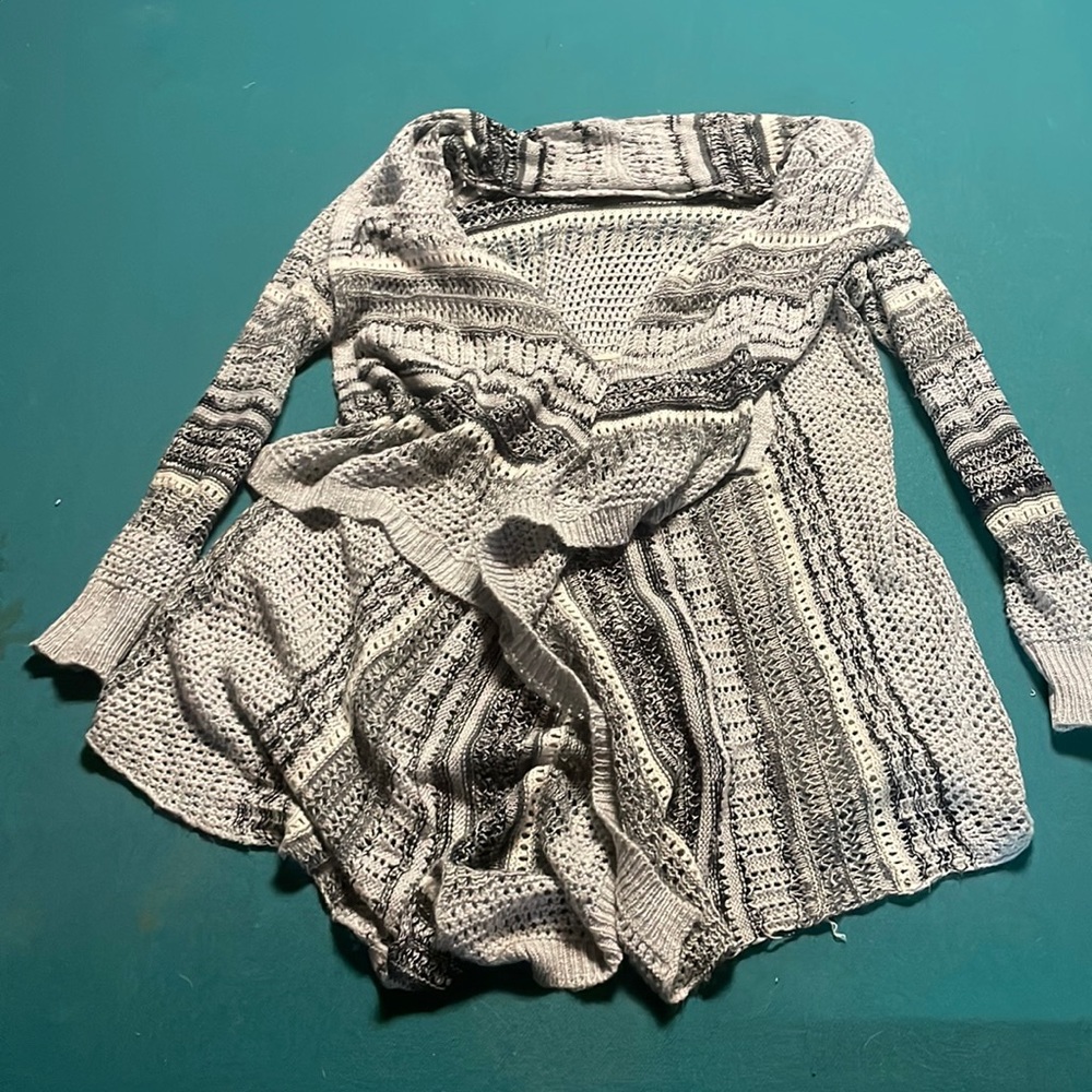 Woman’s sweater grey and black casual or dressy.
